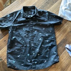 Black button down with small flowers throughout RVCA kids Large